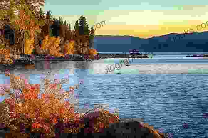 A Tranquil Lake Surrounded By Vibrant Autumn Foliage In Lake Tahoe, Creating A Picturesque And Serene Landscape. California Travel Guide With 100 Landscape Photos