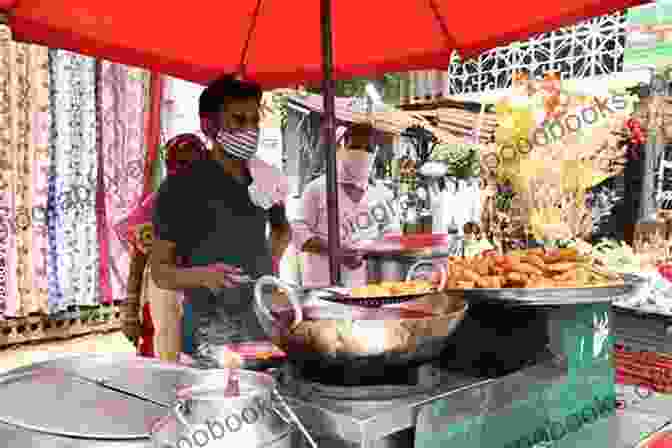 A Vendor Selling Street Food In Delhi Delhi: Adventures In A Megacity