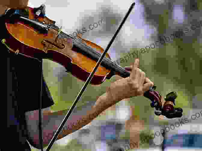 A Violinist Playing With Passion And Intensity How Muscles Learn: Teaching The Violin With The Body In Mind